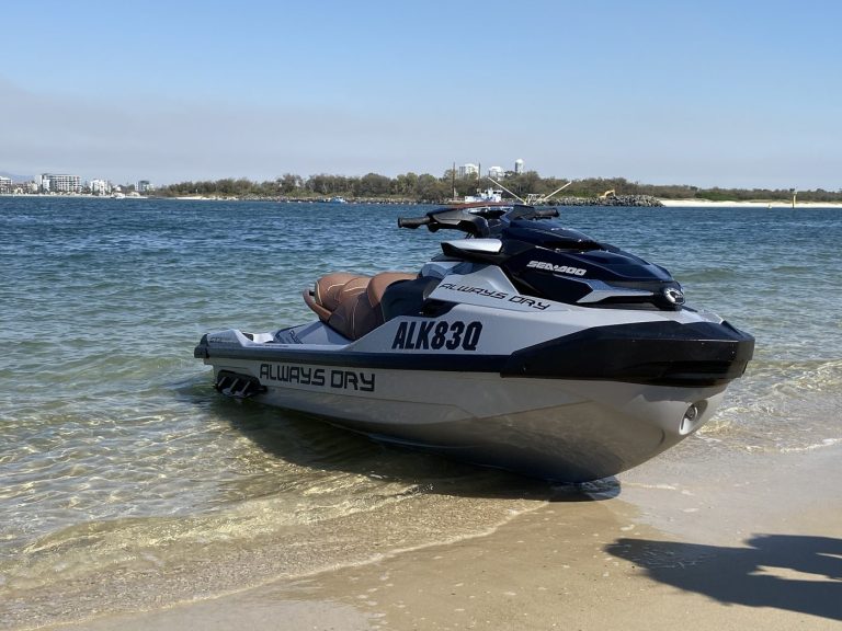 Always Dry branded Sea-Doo jet ski on the beach, Gold Coast