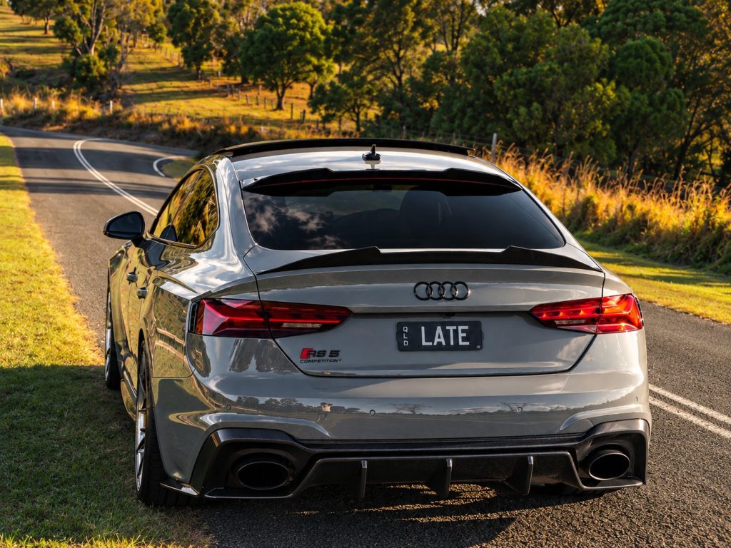 Grey Audi RS5 Competition with Always Dry 9H ceramic coating on a Queensland country road